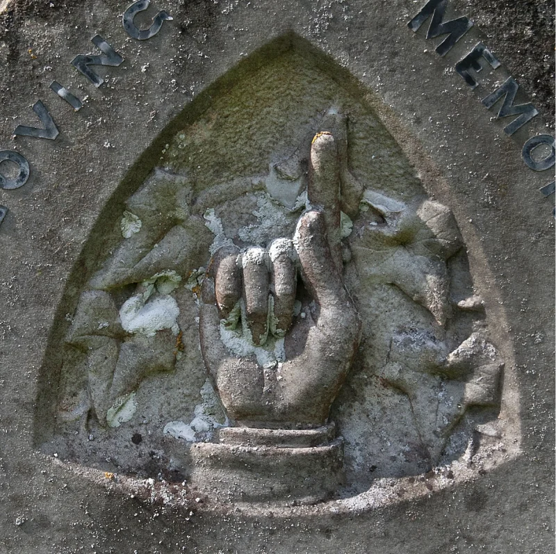 Finger pointing - hand carved in stone